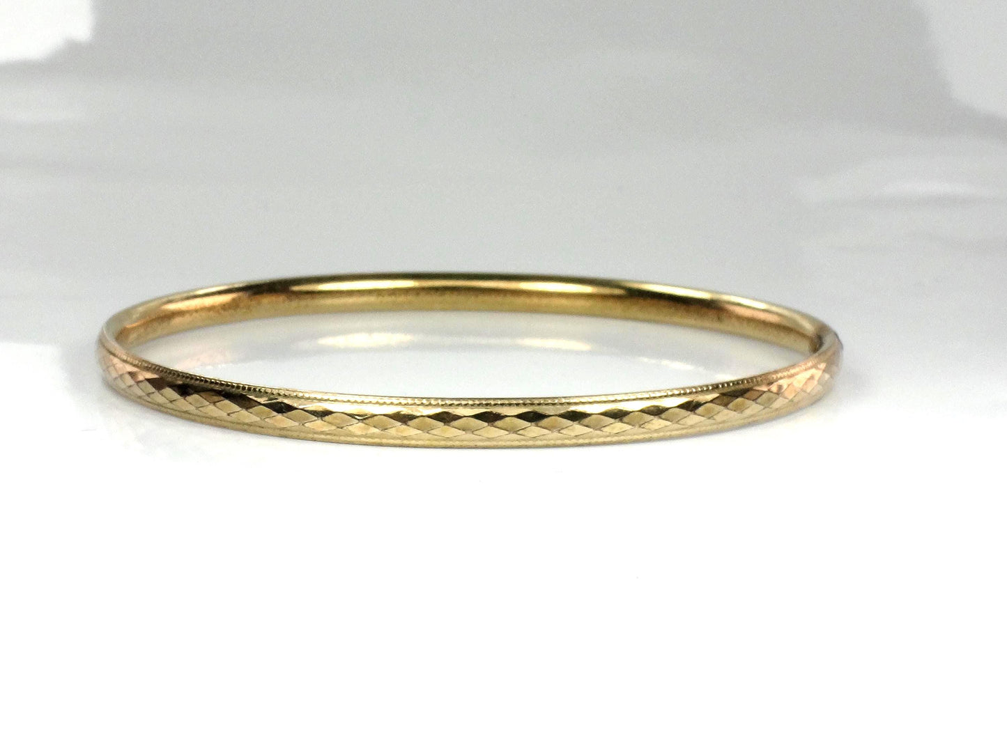 Vintage 12k Gold Filled Bangle Bracelet: Harry S Bick-BelmarJewelers