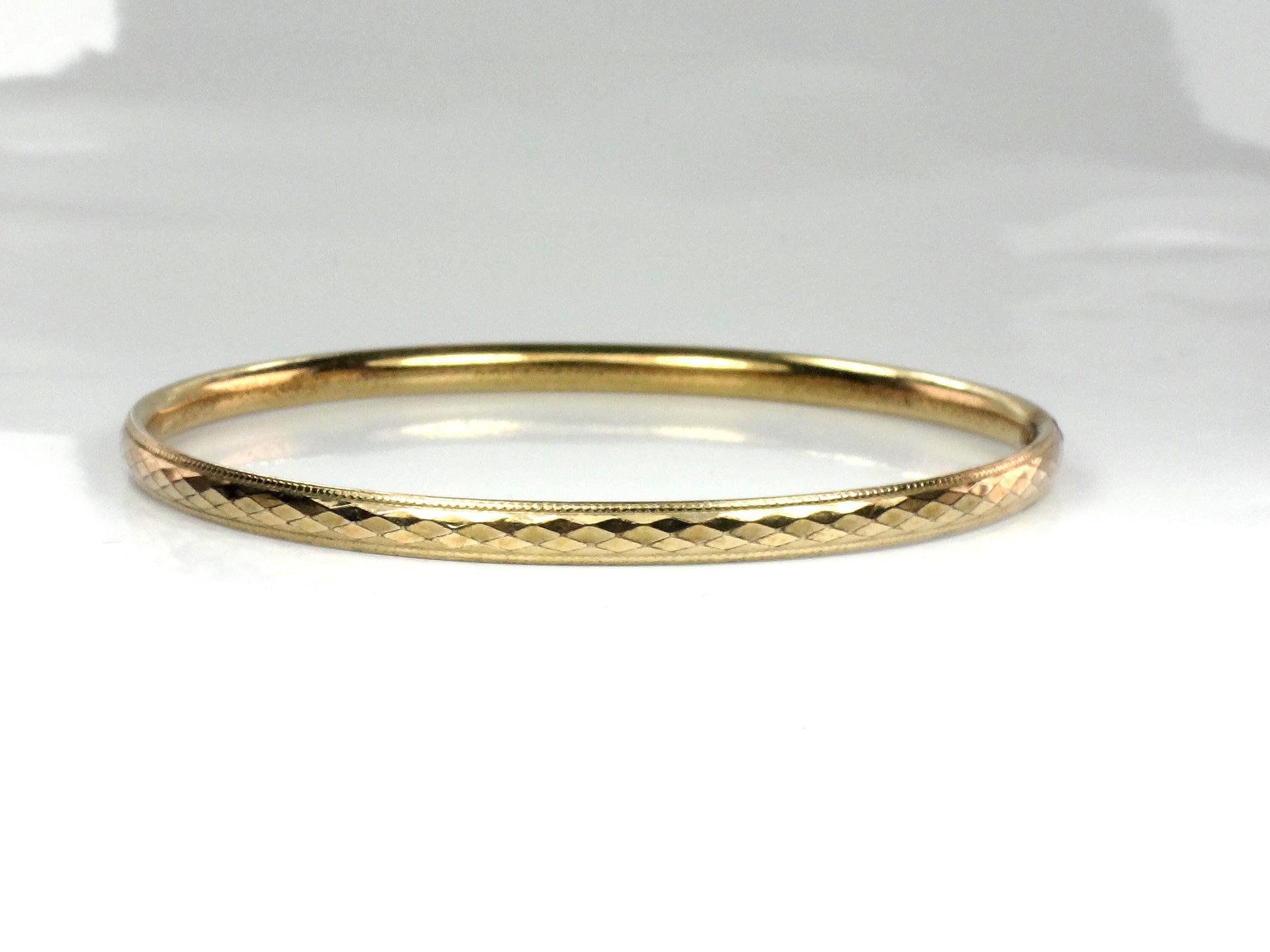 Vintage 12k Gold Filled Bangle Bracelet: Harry S Bick-BelmarJewelers