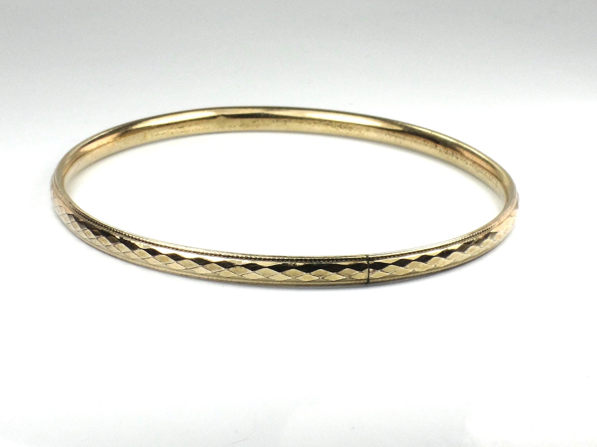 Vintage 12k Gold Filled Bangle Bracelet: Harry S Bick-BelmarJewelers