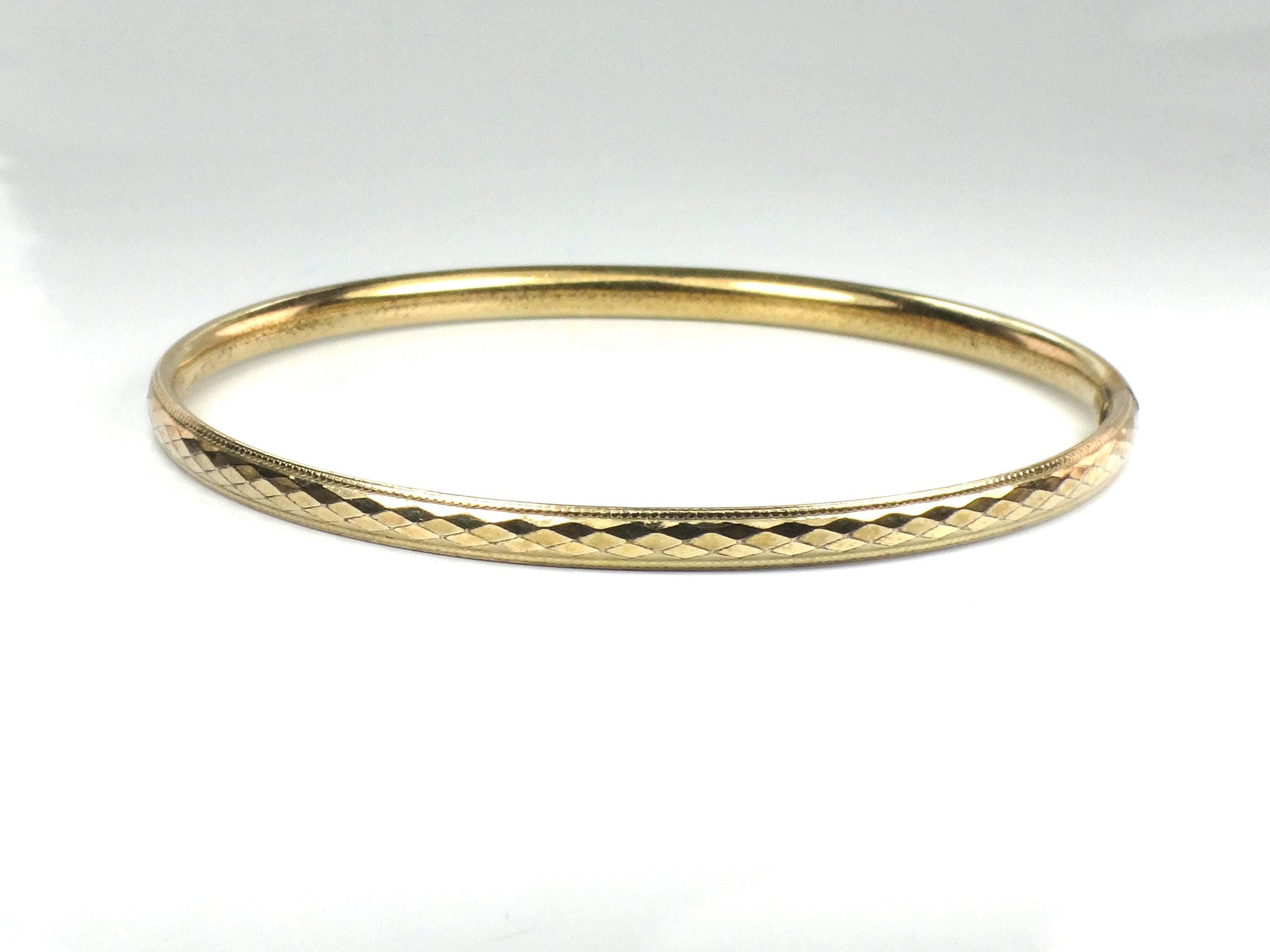 Vintage 12k Gold Filled Bangle Bracelet: Harry S Bick-BelmarJewelers