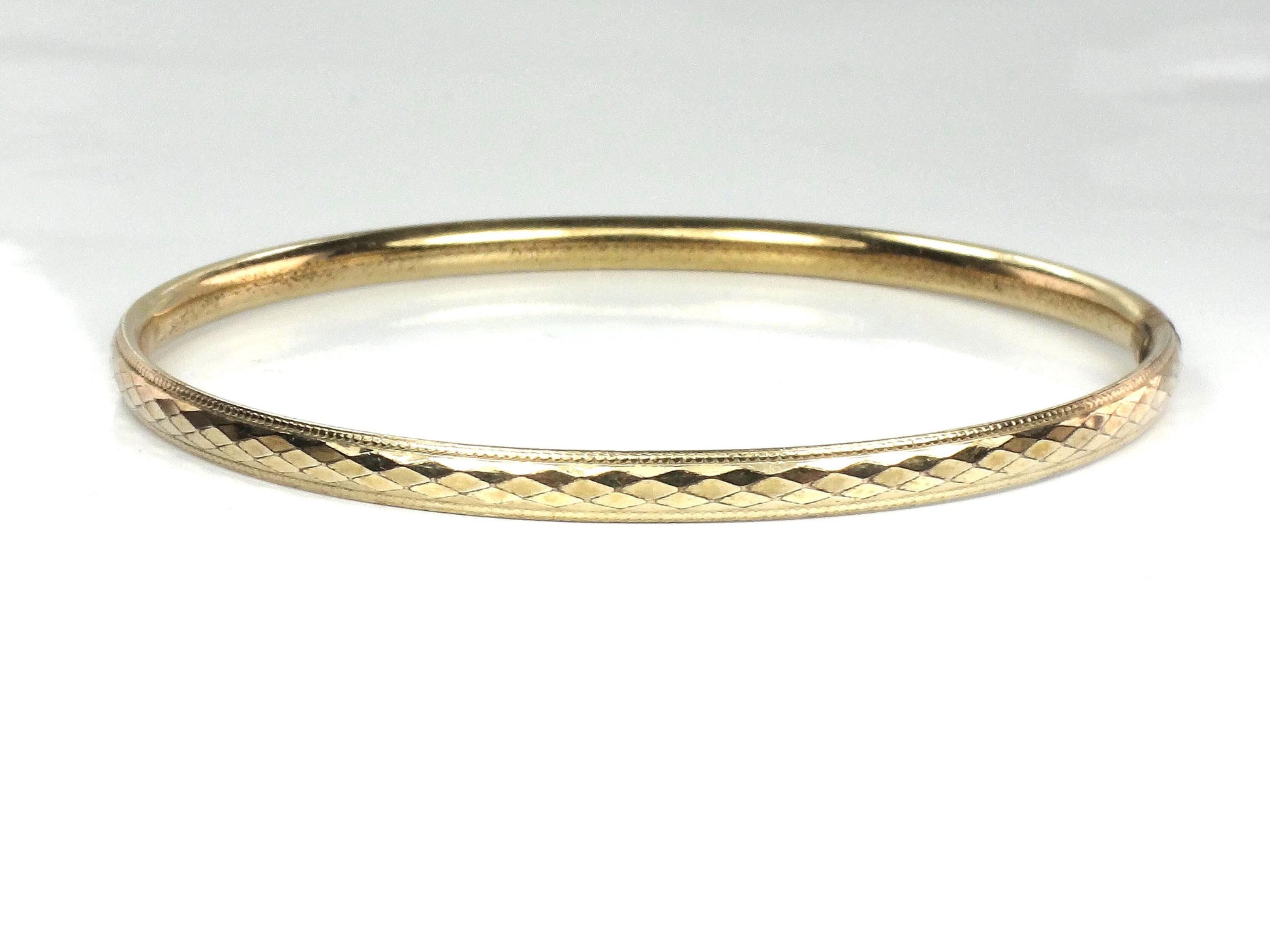 Vintage 12k Gold Filled Bangle Bracelet: Harry S Bick-BelmarJewelers